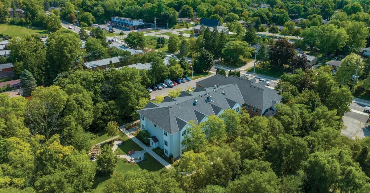 Aerial view of of lush greenspace surrounding Chartwell Georgian Retirement Residence.