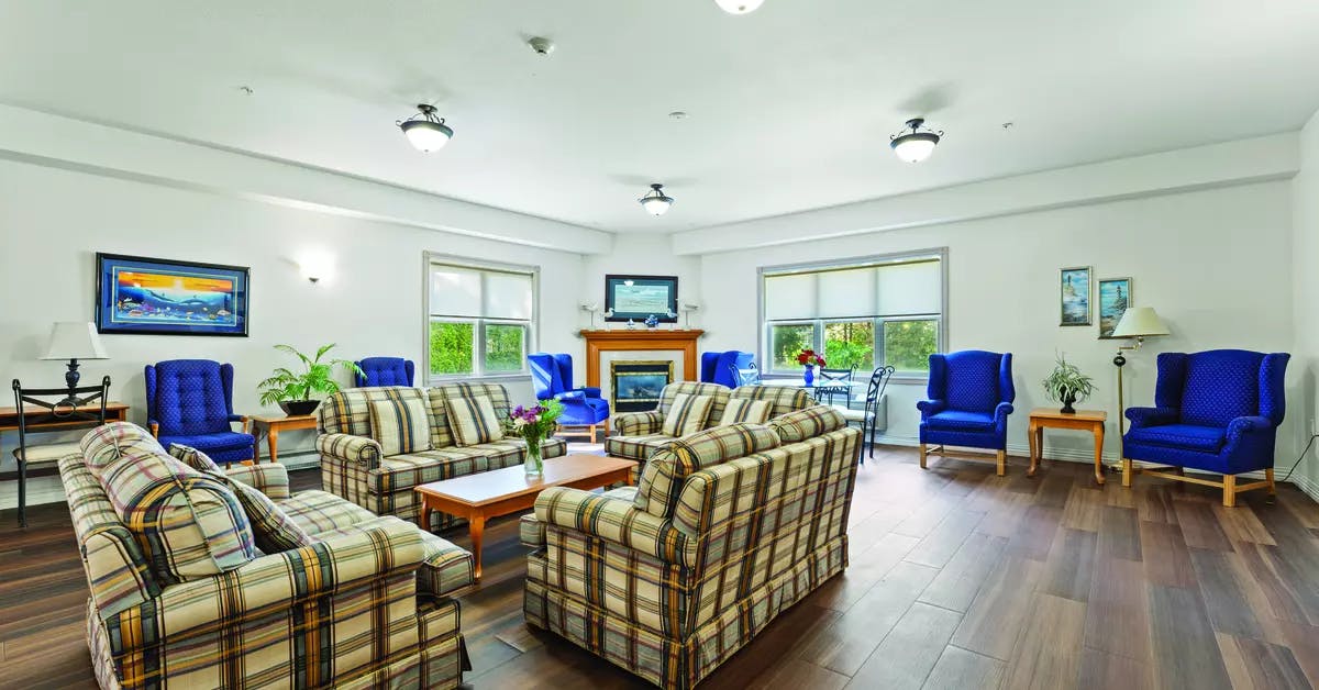 Fireside lounge at Chartwell Barton Retirement Residence.