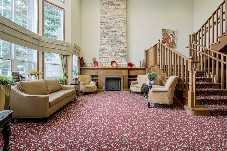 Chartwell Royal on Gordon's common area with fireplace, sofas