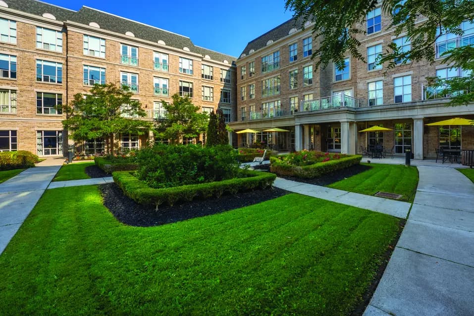Patio and walking paths at Chartwell Robert Speck Retirement Residence