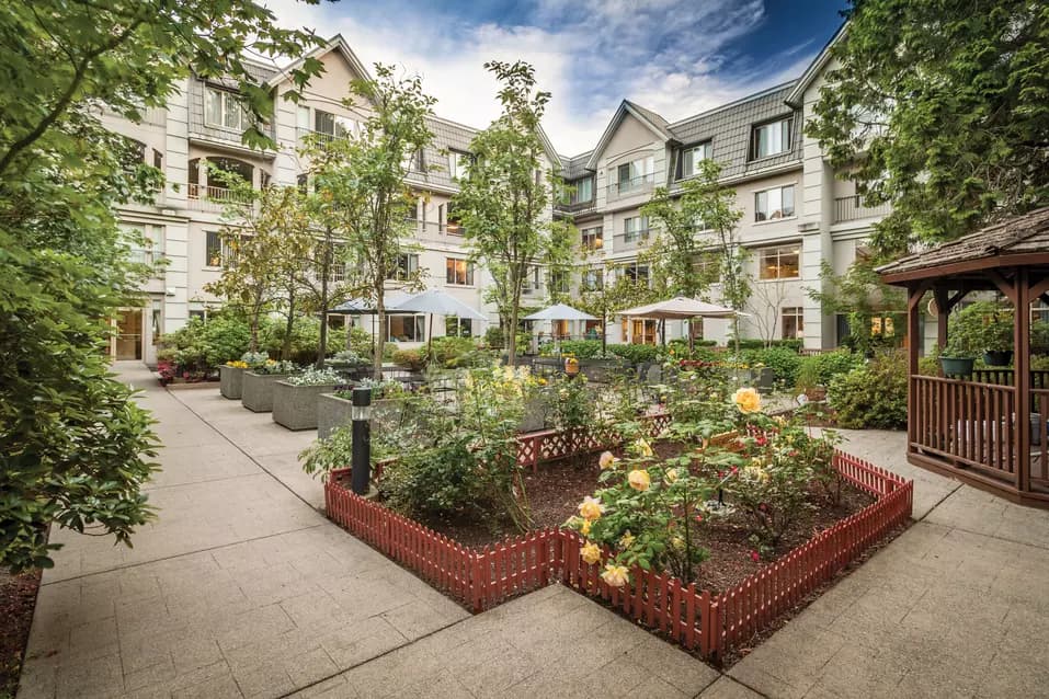 stunning patio with gardens at chartwell crescent gardens retirement residence