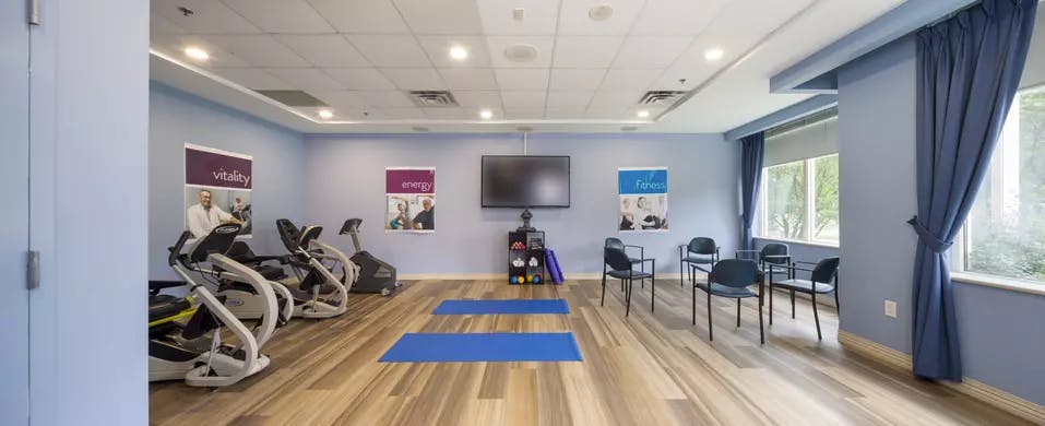 fitness room at chartwell pickering city centre retirement residence