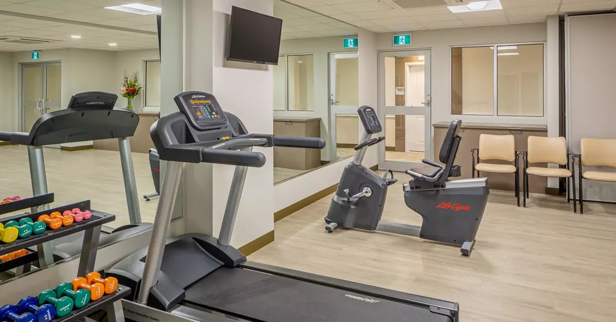 modern fitness room at chartwell carlton retirement residence
