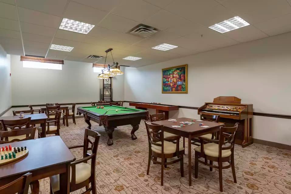 Billiards and games room at Chartwell Georgian Traditions Retirement Residence.